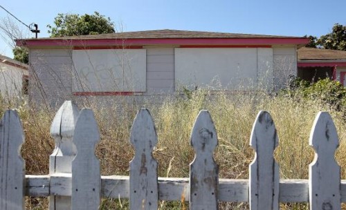 boarded up house