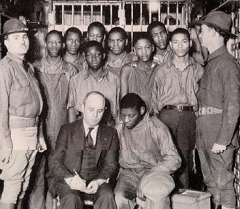 "The Scottsboro Boys" meet with their attorney Samuel Leibowitz.