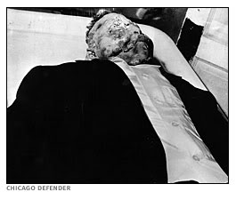 The body of Emmett Till at his funeral shows the mutilation and torture he underwent at the hands of his lynchers in Mississippi in 1955. Photo credit: Chicago Defender