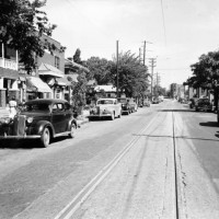 The Greenwood District in happier days, pre-riot. The building with the tile roof, midway back on the left, was the only one still standing since the riot. It now serves as the Cultural Center.