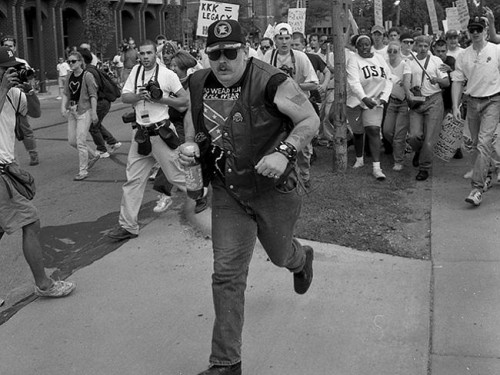 kkk supporter running from mob, ann arbor