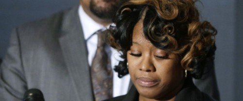 Monica McBride and Walter Ray Simmons, the parents of Renisha McBride address the media during a news conference in Southfield, Mich., Friday, Nov. 15, 2013. Their daughter was shot on Nov. 2  in the face on Theodore P. Wafer's front porch in Dearborn Heights. (AP Photo/Carlos Osorio)