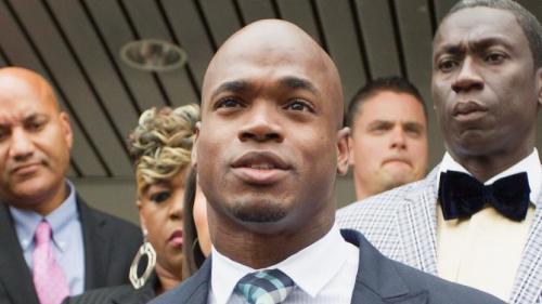 NFL running back Adrian Peterson of the Minnesota Vikings addresses the media after pleading no contest to a lesser misdemeanor charge of reckless assault Nov. 4, 2014, in Conroe, Texas.