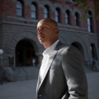 Equal Justice Initiative founder Bryan Stevenson at the site of a 1910 lynching in Dallas.