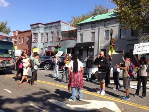 Protestors block a DC bus in support of black student, Jason Goolsby, who was brutally beaten by police. (Photo by Andrew Giambrone)