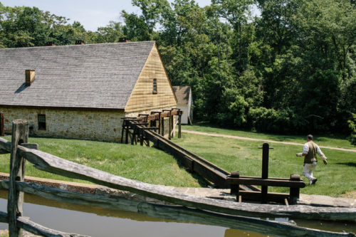 President George Washington relied on six slaves to help run his rye whiskey distillery, one of the largest on the East Coast. This is a re-creation of the grist mill and distillery at Mount Vernon, Washington’s home in Virginia. Credit: Lexey Swall for The New York Times