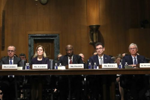 Kenneth C. Frazier, center, of Merck & Co. is one of only four current Fortune 500 C.E.O.s who are black.Credit...Win McNamee/Getty Images