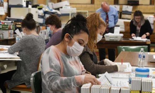 Ballots cast in Racine, Wisconsin are tabulated on Monday. Photograph: Mark Hertzberg/Zuma Wire/Rex/Shutterstock