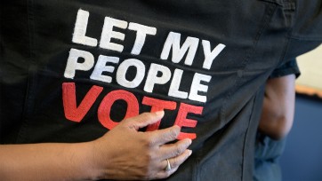 A shirt with the words "LET MY PEOPLE VOTE" in bold text.