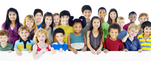 Multi-Ethnic Group of Children Holding Empty Billboard Photo caption here (include photo credit)