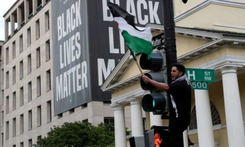 Pro-Palestinian demonstrators take part in a protest titled ‘Stop Jerusalem Expulsions, save Sheikh Jarrah’ outside of the White House in Black Lives Matter Plaza in Washington last month. Photograph: Leah Millis/Reuters