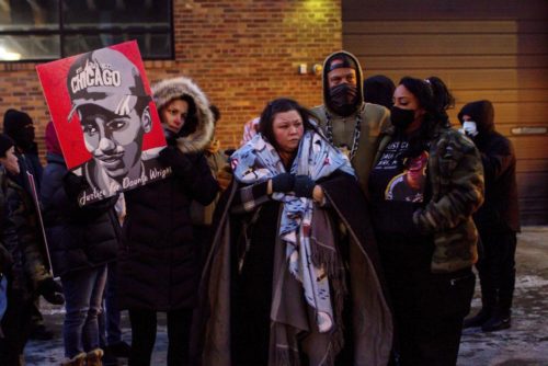 Daunte Wright's mother and community members at the Minneapolis apartment building where activists say Judge Chu lives after former officer Potter was sentenced to two years in prison (Nicole Feri/AP)