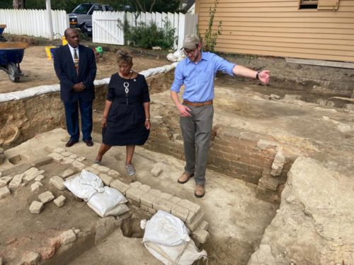 1000-4 Pastor Reginald F. Davis of First Baptist Church and Jack Gary, Colonial Williamsburg's director of archaeology, stand at the foundation of First Baptist Church, one of the oldest Black churches in the country. (AP Photo/Ben Finley, File)
