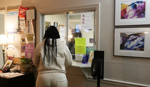 A woman stands at the check-in window of the Hope Medical Group for Women in Shreveport, La. on April 19. (Francois Picard / AFP via Getty Images file)