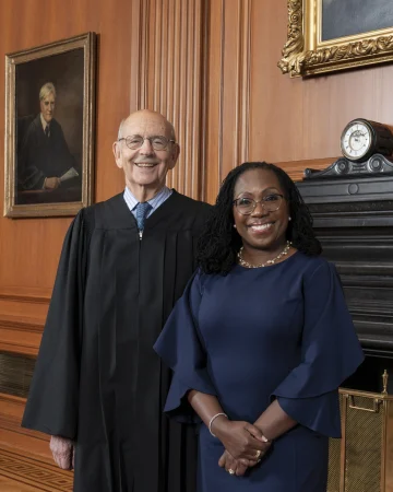 Former Justice Stephen G. Breyer with Justice Ketanji Brown Jackson in the Justices’ Conference Room, Supreme Court Building. (Fred Schilling / Collection of the Supreme Court of the United States)