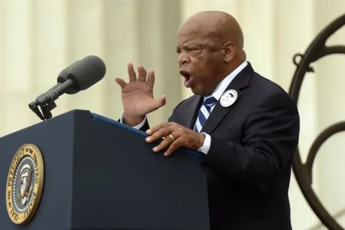 Congressman Lewis speaks to a crowd in Washington, D.C. at the “Let Freedom Ring” commemoration event in 2013 (Michael Reynolds-Pool/Getty Images)