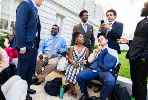 Congressional interns wait to attend a hearing of the House select committee investigating the Jan. 6 insurrection. (TOM WILLIAMS VIA GETTY IMAGES)