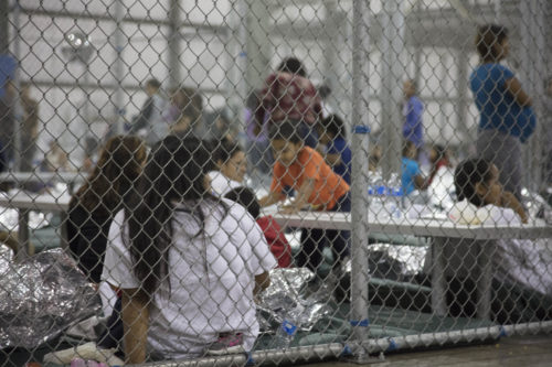 U.S. Border Patrol agents conduct intake of illegal border crossers at the Central Processing Center in McAllen, Texas, Sunday, June 17, 2018.