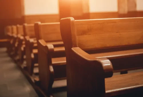 Empty church pews (Roman Zaiets/Shutterstock)