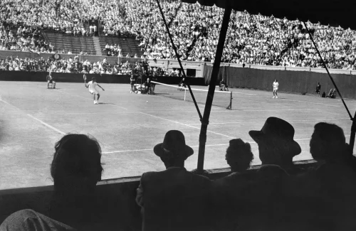 Ms. Gibson, left, broke the color barrier to the sport in 1950 when she became the first Black person to compete in the U.S. Open. By the decade’s end, she had amassed a total of 11 Grand Slam titles. (Carl T. Gossett Jr./The New York Times)