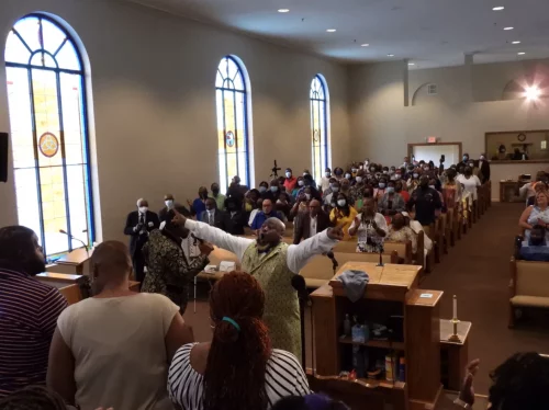 Congregants at Mt. Moriah Missionary Baptist Church in Paducah, Kentucky, gather as part of the community's Eighth of August celebrations. (Derek Operle/WKMS)