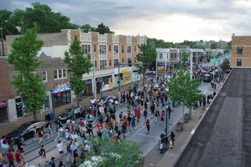 Protesters walking along Delmar Boulevard in 2020, after the police murder of George Floyd in Minneapolis. (Lawrence Bryant/Reuters)