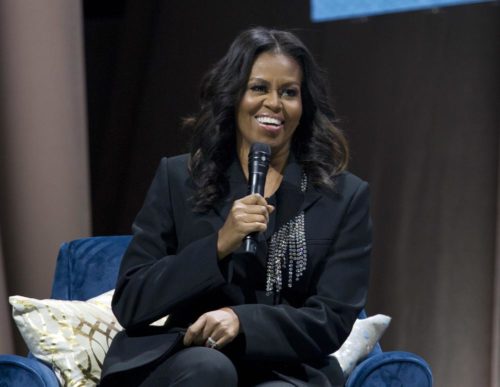 Former first lady Michelle Obama promoting her previous her book "Becoming" in 2018. (AP Photo/Jose Luis Magana, File)