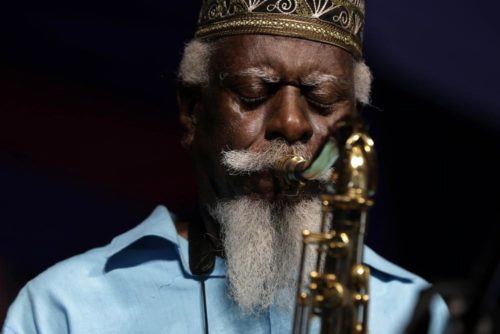 Jazz saxophonist Pharoah Sanders at the New Orleans Jazz and Heritage Festival in New Orleans, Friday, May 2, 2014. (AP Photo/Gerald Herbert, File)