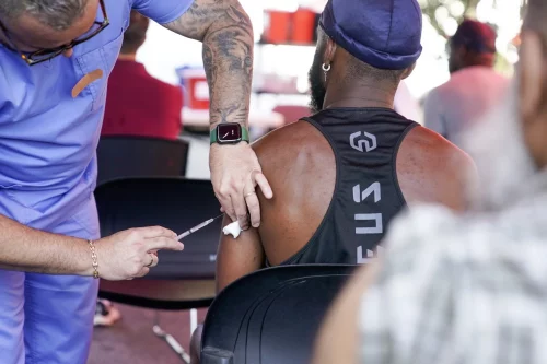 A nurse administers the monkeypox vaccine at a walk-in clinic at the North Jersey Community Research Initiative last month. (Seth Wenig / AP file)