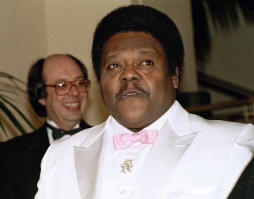 Fat Domino in a white tux with pink bowtie