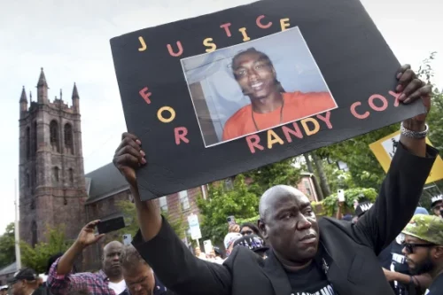 Civil rights attorney Benjamin Crump at a march for Justice for Randy Cox in New Haven, Conn., on July 8. (Arnold Gold / AP file)