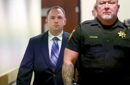 Aaron Dean arrives in court in Fort Worth, Texas, on Dec. 5 for the first day of his trial in the murder of Atatiana Jefferson. (Amanda McCoy / Star-Telegram via AP, Pool)