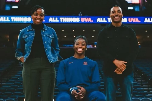 Solace owners Folasade Omogun-Broadnax and Terence Davis flank University of Virginia basketball star Mir McLean. (Darrius Terrell)