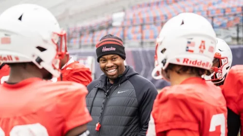 University of Houston associate head coach and defensive coordinator Doug Belk with players during practice Dec. 21 at Independence Stadium in Shreveport, Louisiana. (Nitashia Johnson for Andscape)