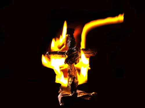 A Mississippi man is convicted of burning a cross in his front yard to threaten a Black family. (Guenther Gassler/Getty Images/EyeEm)