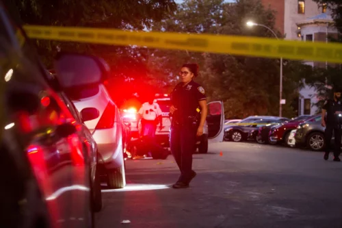 220901-shooting-crime-scene-mjf-1204-958f3b New York police investigate a shooting in Brooklyn on July 21. (Michael Nagle / Bloomberg via Getty Images file)