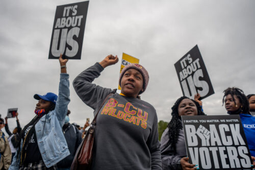 SELMA, ALABAMA - MARCH 09: Marchers chant during the Black Voters Matter's 57th Selma to Montgomery march on March 09, 2022 in Selma, Alabama. People gathered alongside organizations: Black Voters Matter, Rainbow PUSH Coalition, and the Transformative Justice Network to march the 11-mile original route that the late U.S. Rep. John Lewis and other civil rights leaders marched on March 7, 1965. In 1965, the march began at the Edmund Pettus Bridge and was met with brutal beatings of civil rights marchers at the hands of law enforcement. The march would later become known as "Bloody Sunday". The televised attacks were seen all over the nation, prompting public support for the civil rights activists in Selma and for the voting rights campaign. (Photo by Brandon Bell/Getty Images)