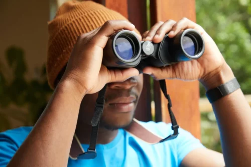 pexels-laker-5792970-scaled Black man using binoculars