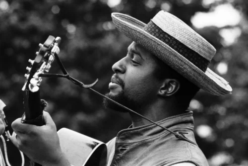 Len Chandler in performance at the 1964 Newport Folk Festival. A classically trained oboe player, he became part of the Washington Square Park folk scene soon after arriving in New York from Ohio. (avid Gahr/Getty Images)