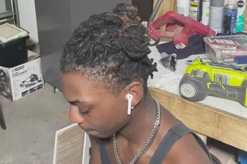 Darryl George, 17, wears his hair in locs, or ropelike strands that he pins on his head in a barrel roll, a protective style that reflects Black culture. The hairstyle has landed him in suspension at Barbers Hill High School in Mont Belvieu, Texas.