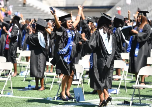 Spelman College graduates celebrate during commencement in Atlanta in 2021. (Paras Griffin / Getty Images file)