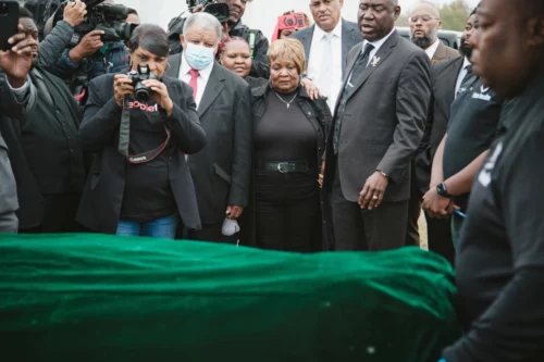 231113-dexter-wade-exhumation-mn-1800-e602b5 Dexter Wade's mother, Bettersten Wade, watches as his body is carried after being exhumed from a pauper's grave at the Hinds County jail's penal farm. (Ashleigh Coleman for NBC News)