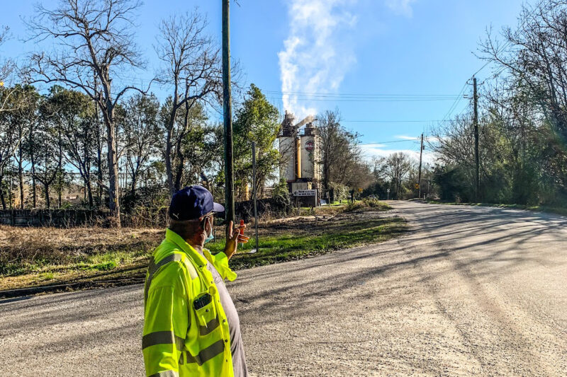 Walter Moorer observes fumes emitted from the Hosea Weaver asphalt plant near Chin Street