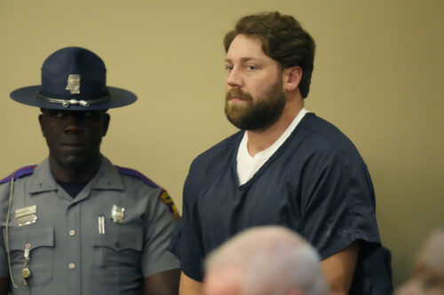 Former Rankin County sheriff’s deputy Hunter Elward, right, appears in the Rankin County Circuit Court in Brandon, Miss., Monday, Aug. 14, 2023. Elward is one of six white former Mississippi law officers that pleaded guilty to state charges on Monday for torturing two Black men in a racist assault. All six had recently admitted their guilt in a connected federal civil rights case. (AP Photo/Rogelio V. Solis)