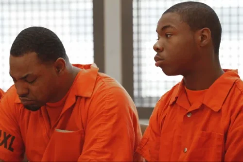 Marvell Smith, right, entered the unit and became the target of harassment. But he says other residents and the unit's leaders quickly took action to stop it. (NBC News)