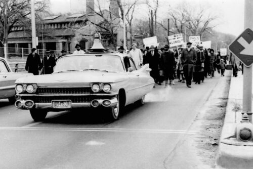 Protesters marching against school segregation in Milwaukee 1964.