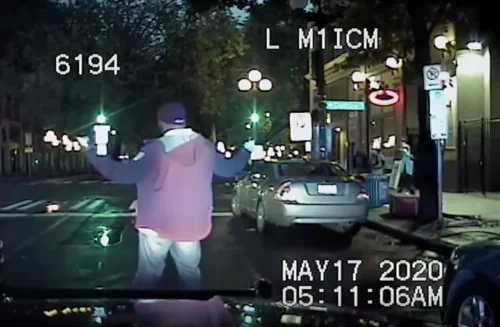 Anthony Sims, left, was stopped by police, purportedly for driving without his lights on in May 2020. (Seattle Police Department)