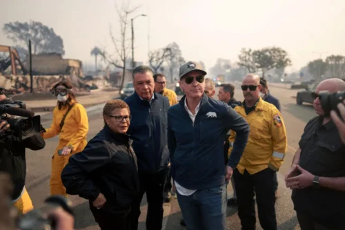 California Governor Gavin Newsom and Los Angeles Mayor Karen Bass tour the downtown business district of Pacific Palisades as the Palisades Fire continues to burn on January 8, 2025.(Photo by Eric Thayer/Getty Images)