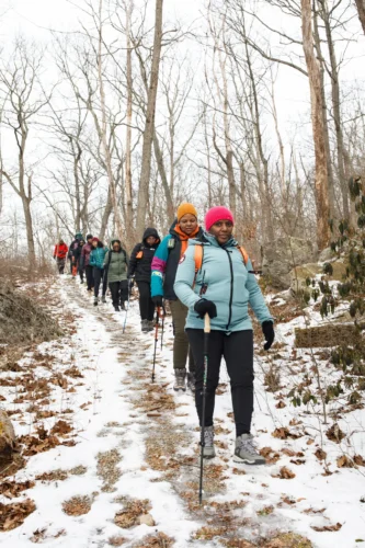 Around 40 people participated in a 5.3-mile trek through Harriman State Park in New York on Sunday as part of a Black History Month hike hosted by Outlandish, a store in Brooklyn. Credit. Brian Fraser for The New York Times.