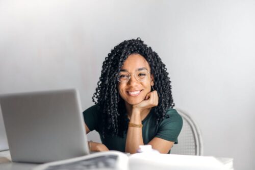 Black female student using laptop